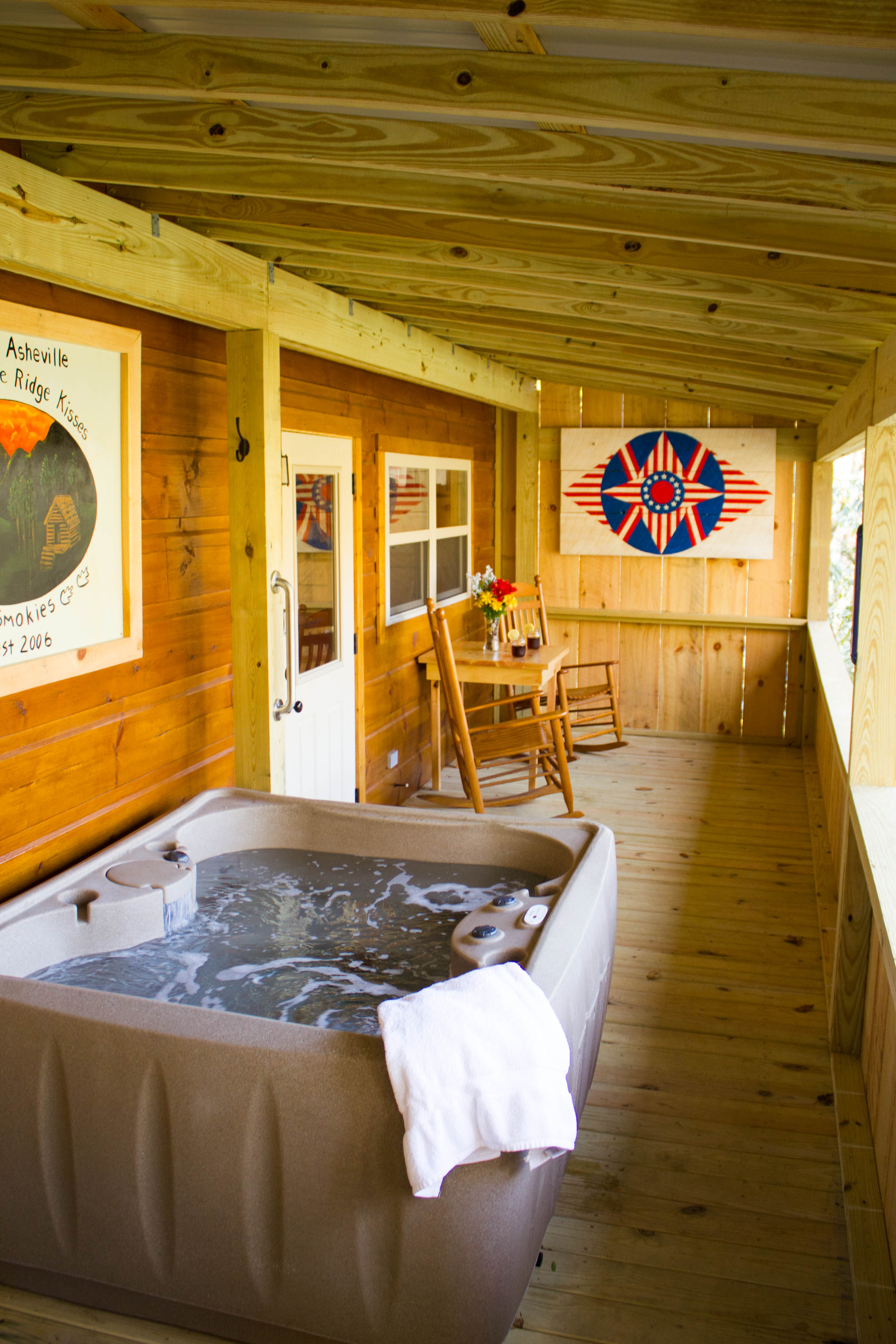 Ewell Operate Woods Cabins of Asheville – Romantic Cabins with Hot Tubs & Fireplaces